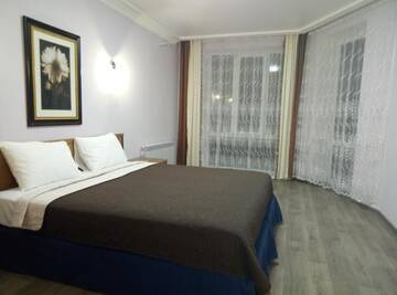 Фото номера Апартаменты с 2 спальнями Апартаменты SKY&amp;KTS Apartments г. Борисполь 16